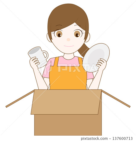 圖：一位女士雙手拿著餐具和一個紙箱 137600713