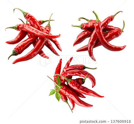 Red chili peppers arranged, isolated on white background, concept of spicy cooking ingredient Red chili peppers arranged, isolated on white background, concept of spicy cooking ingredient 137600918