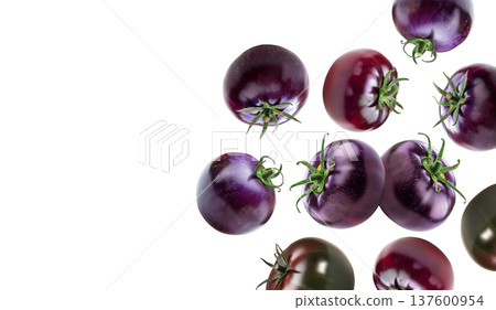 Glossy black tomatoes with red streaks shown isolated on a white background, representing freshness and organic produce 137600954