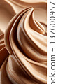 Closeup of smooth, thick, wavy beige cream swirls on soft background showing luxury texture concept of a liquid foundation 137600957
