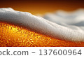 Closeup view of curved beer foam and golden bubbles on warm blurred background, expressing freshness concept 137600964