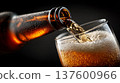 Fizzy dark stout beer being poured into chilled glass on warm brown background, concept of refreshment and taste 137600966