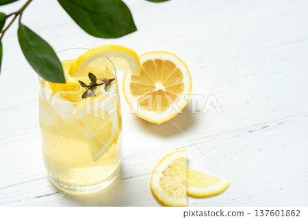 Homemade lemonade with lemon on a white background 137601862