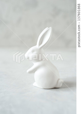 Easter greeting background with white Easter bunny Easter greeting background with white Easter bunny 137601868