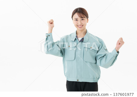 Young female worker on white background 137601977