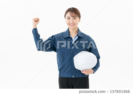 Young female worker on white background 137601988