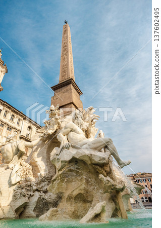 Fountain of the Four Rivers statue and obelisk at Piazza Navona in Rome Italy 137602495