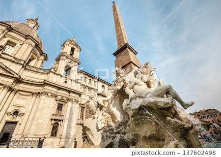 Fountain of the Four Rivers statue and Sant Agnese in Agone church in Rome Italy Fountain of the Four Rivers statue and Sant Agnese in Agone church in Rome Italy 137602498