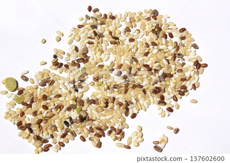 These are grains of mixed grain placed on a white background. These are grains of mixed grain placed on a white background. 137602600