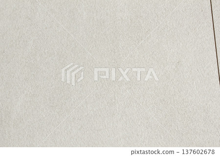 A close-up of a tiled hardwood floor. 137602678