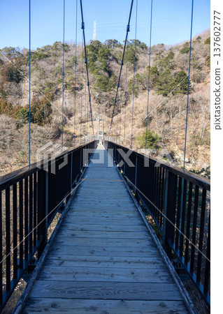 Scenery of Kinugawa Onsen, Nikko City, Tochigi Prefecture, suspension bridge and valley, walking path in the hot spring town 137602777