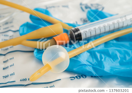 Foley catheter and urine drainage bag collect urine for disability or patient in hospital. Foley catheter and urine drainage bag collect urine for disability or patient in hospital. 137603201