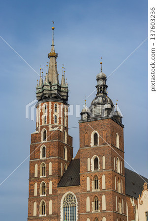 Two Gothic towers of St. Mary's Basilica in Krakow Two Gothic towers of St. Mary's Basilica in Krakow 137603236