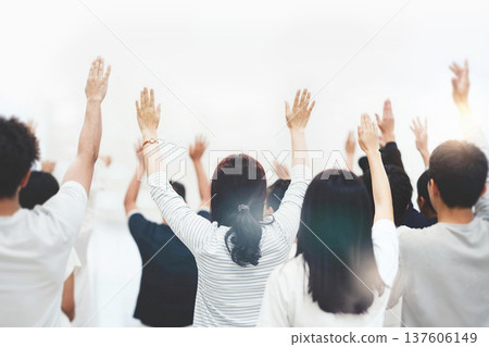Christians passionately praising, praying, and worshipping, a Holy Spirit-filled church gathering with a cheering crowd in the background Christians passionately praising, praying, and worshipping, a Holy Spirit-filled church gathering with a cheering crowd in the background 137606149
