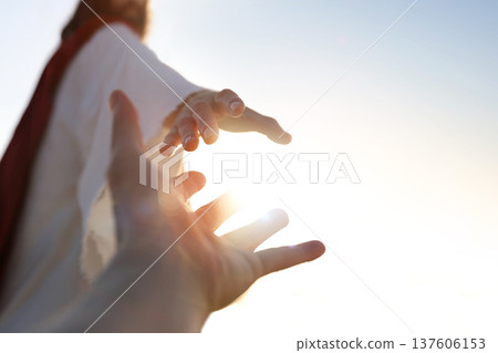 A desperate Christian hand reaching out to the hand of Jesus Christ, with a bright sunny background, concept of faith and salvation. 137606153