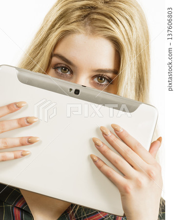Young woman using tablet Young woman using tablet 137606803