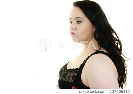 Woman in black bra showing her breast chest. Woman in black bra showing her breast chest. 137606813