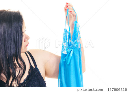 Plus size woman fitting satin nightwear Plus size woman fitting satin nightwear 137606816