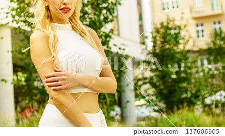 Blonde woman in city Blonde woman in city 137606905