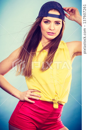 Pretty teenage girl in fashionable clothes. Pretty teenage girl in fashionable clothes. 137607261