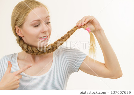 Blonde girl with braid hair 137607659