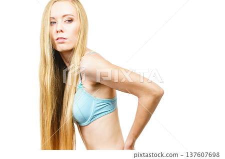 Girl long blond hair wearing bra 137607698
