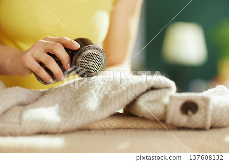 Removing Pilling from Winter Coat with Fabric Shaver Removing Pilling from Winter Coat with Fabric Shaver 137608132