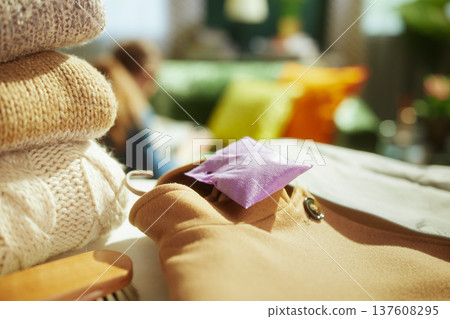 Seasonal Wardrobe Maintenance with Clothes Brush and Lavender Seasonal Wardrobe Maintenance with Clothes Brush and Lavender 137608295