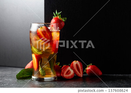 Summer refreshing drink with ice, mint, and strawberries. Summer refreshing drink with ice, mint, and strawberries. 137608624