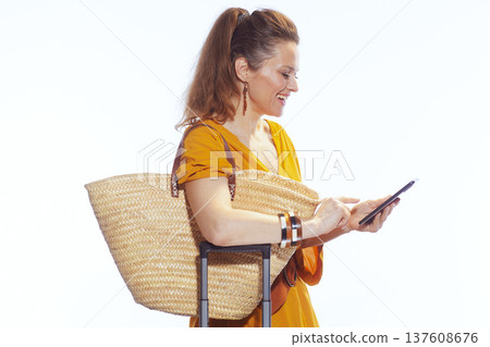 Profile of a Woman Traveler Using Mobile Phone App 137608676