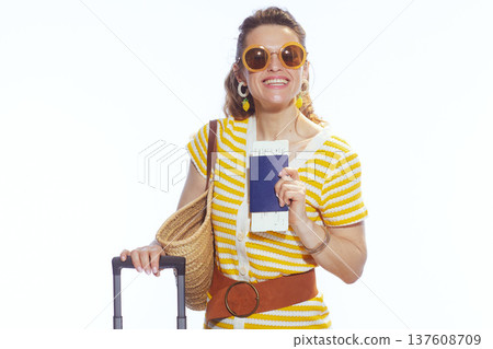 Stylish Traveler with Luggage and Passport 137608709