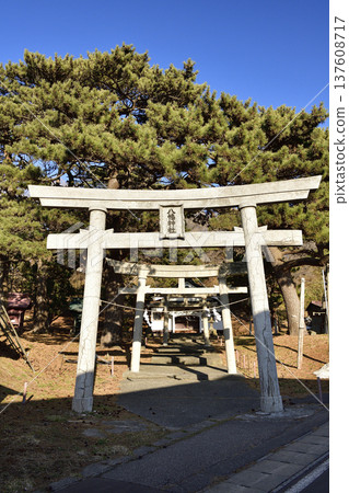 Photographing the grounds of Ishizaki Hachiman Shrine in Kaminokuni, Hokkaido in early spring Photographing the grounds of Ishizaki Hachiman Shrine in Kaminokuni, Hokkaido in early spring 137608717
