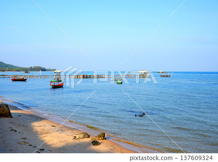 Boat at pier in sea. Landscape a traditional fishing village in Rachvem Bay Phu Quoc Island, Vietnam 137609324