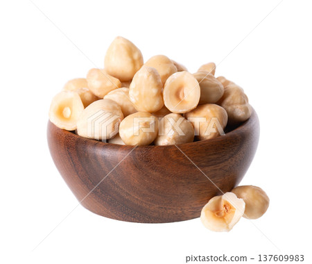 Hazelnut isolated on white background. Peeled hazelnuts in wooden bowl. Clipping path. 137609983