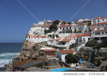 Traditional white village of Azenhas do Mar perched on a cliff, Portugal. Traditional white village of Azenhas do Mar perched on a cliff, Portugal. 137610218