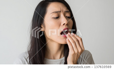 Young women taking supplements and medicines (health care, supplements) 137610569