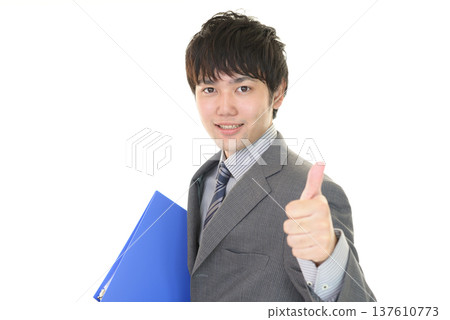 A businessman who is pleased 137610773