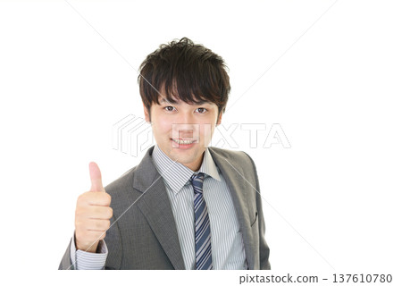 A businessman who is pleased 137610780