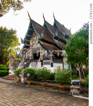 Exterior of City Pillar Shrine San Lak Mueang in Chiang Mai Thailand. Historic temple with traditional architecture, sacred cultural landmark and popular travel destination in northern Thailand. Exterior of City Pillar Shrine San Lak Mueang in Chiang Mai Thailand. Historic temple with traditional architecture, sacred cultural landmark and popular travel destination in northern Thailand. 137611140