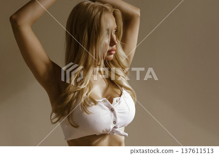 Sexy beauty portrait of attractive busty woman in white lingerie, feminine body and healthy lifestyle concept Sexy beauty portrait of attractive busty woman in white lingerie, feminine body and healthy lifestyle concept 137611513