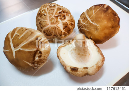 Shiitake mushrooms on a cutting board 137612461