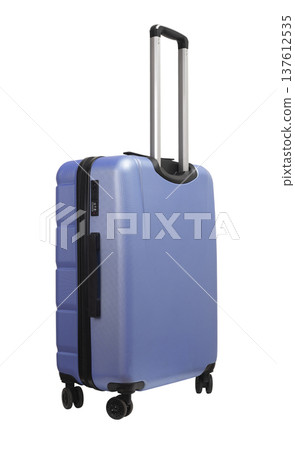 Blue hardcase luggage with telescopic handle, grip, lock and zipper, tilted at angle, isolated on Blue hardcase luggage with telescopic handle, grip, lock and zipper, tilted at angle, isolated on 137612535