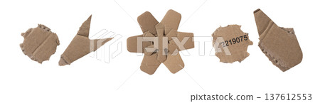 Set of torn brown cardboard fragments with rough edges, creases, cut shapes, and recycled material Set of torn brown cardboard fragments with rough edges, creases, cut shapes, and recycled material 137612553