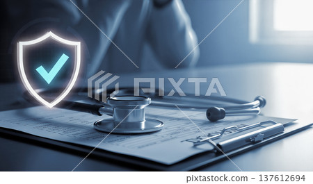 Medical stethoscope lying on patient document clipboard near glowing digital safety shield holographic icon representing healthcare insurance guarantee and secure clinic protection service Medical stethoscope lying on patient document clipboard near glowing digital safety shield holographic icon representing healthcare insurance guarantee and secure clinic protection service 137612694
