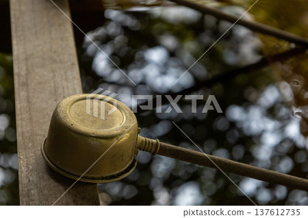 Nogi Park, August: Trees and a ladle reflected in the water of the chozuya (purification fountain) 137612735
