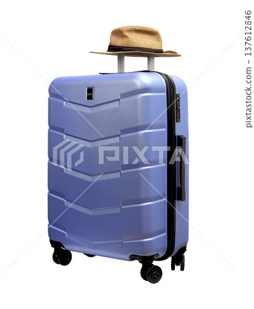 Angled view of a modern wheeled hard case with blue and purple tones. Pink sunhat rests on top, 137612846