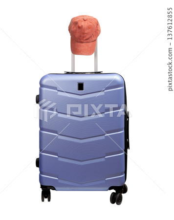 suitcase with pink baseball cap on top. Polycarbonate hard shell carry on luggage for summer suitcase with pink baseball cap on top. Polycarbonate hard shell carry on luggage for summer 137612855