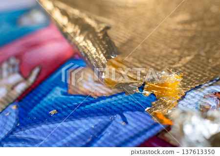Gilding theme with a leaf of beaten gold and blade Gilding theme with a leaf of beaten gold and blade 137613350