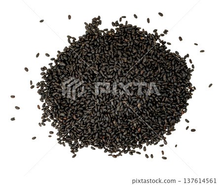 Top view of a pile of dry black basil seeds isolated. Organic sabja seeds or sweet basil seeds used in healthy drinks and desserts. High quality studio macro photography. 137614561