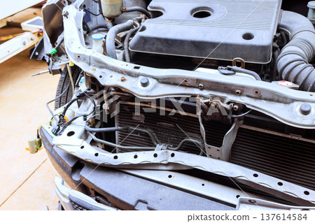 Car engine repair process taking place in garage Car engine repair process taking place in garage 137614584